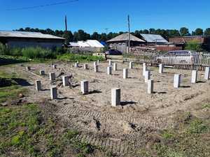 Фундамент двухэтажного дома из профилированного бруса с террасой и котельной