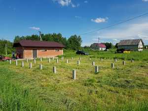 Сваи под ростверк для двухэтажного дома из бруса с террасой