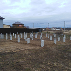 Фундамент для двухэтажного дома из бруса с пристроенными гаражом и баней, навесами, крыльцом в пос. Слобода вольная, Томской области