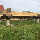 Фундамент на забивных ж/б сваях для дома из бруса в поселке под Вологдой от компании 35FS