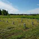 Фундамент на забивных ж/б сваях с бетонным ростверком для дома из бруса с террасой в селе Корнилово Томской области от компании 35FS