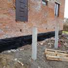 Фундамент на забивных ж/б сваях с обвязкой швеллером для крыльца и террасы к кирпичному дому в поселке Родник Томской области от компании 35FS