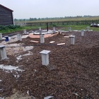 Фундамент на забивных ж/б сваях для дома из бруса с фундаментом под печь в деревне Березкино Томской области от компании 35FS