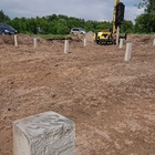 Фундамент на забивных ж/б сваях с бетонным ростверком для дома из газобетона с облицовкой в селе Карамышево Липецкой области от компании 35FS