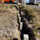 Фундамент на забивных ж/б сваях с бетонным ростверком для дома из газобетона с облицовкой кирпичом в селе Доброе Липецкой области от компании 35FS