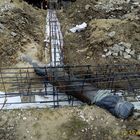 Фундамент на забивных ж/б сваях с бетонным ростверком для дома из газобетона с облицовкой кирпичом в селе Доброе Липецкой области от компании 35FS