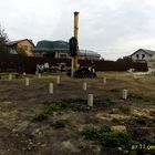 Фундамент на забивных ж/б сваях с бетонным ростверком для хозяйственной постройки из бруса с гаражом и подвалом в городе Грязи Липецкой области от компании 35FS