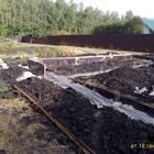 Фундамент на забивных ж/б сваях с бетонным ростверком для хозяйственной постройки из бруса с гаражом и подвалом в городе Грязи Липецкой области от компании 35FS