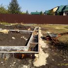 Фундамент на забивных ж/б сваях с бетонным ростверком для хозяйственной постройки из бруса с гаражом и подвалом в городе Грязи Липецкой области от компании 35FS