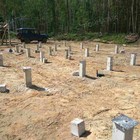 Фундамент на забивных ж/б сваях для дома из бруса в пгт Дубровка Ленинградской области от компании 35FS